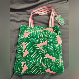Lilly Pulitzer towel tote, towel converts to bag. Plus luggage tag